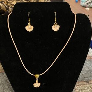 Handcrafted peach cord with a peach and pearl pendant